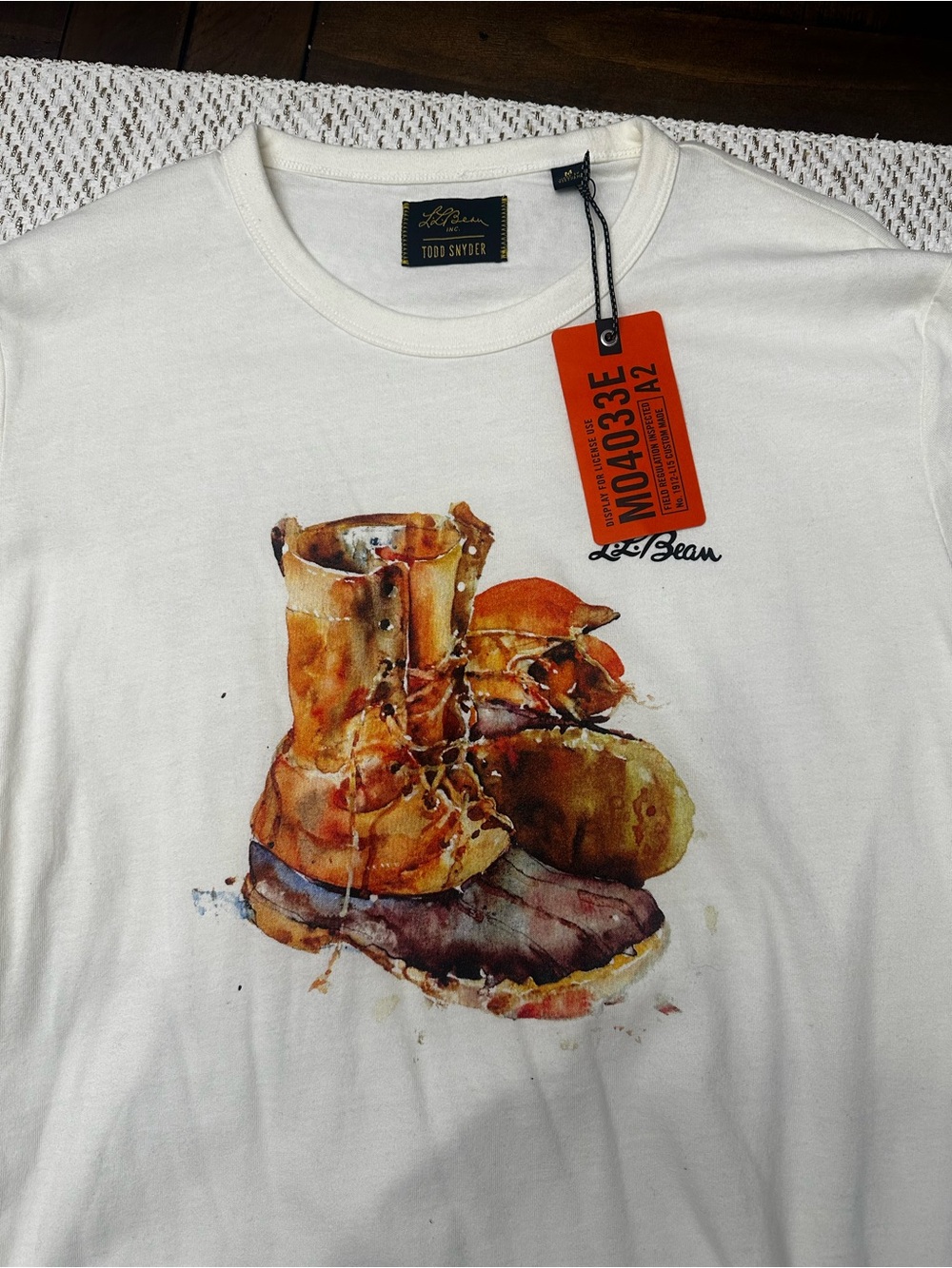 Todd Snyder & LL Bean collab White Tee with Orange Tag and Subtle Brown Graphic